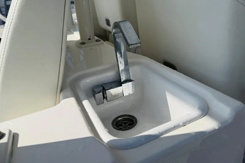 Slide: The Image of Sink with modern faucet on 2021 Everglades 395 Center Console boat. - 43