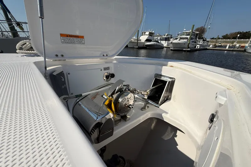 Slide: The Image of Anchor compartment of 2021 Everglades 395 Center Console at marina. - 44