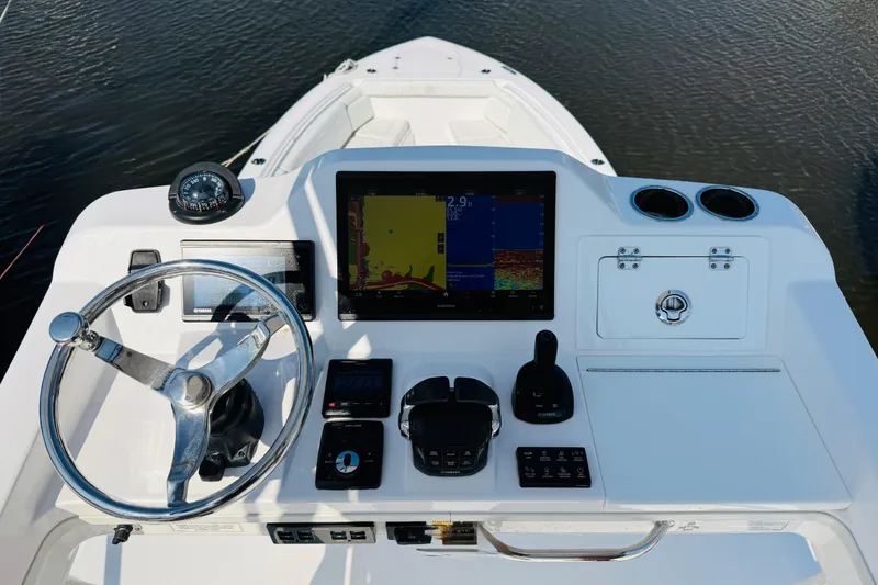 Slide: The Image of Helm of 2021 Everglades 395 Center Console with navigation and control systems. - 48