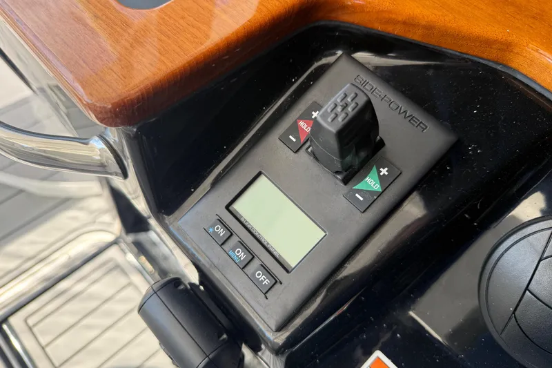 Slide: The Image of Control panel of a 2021 Everglades 395 Center Console boat with joystick and display. - 6