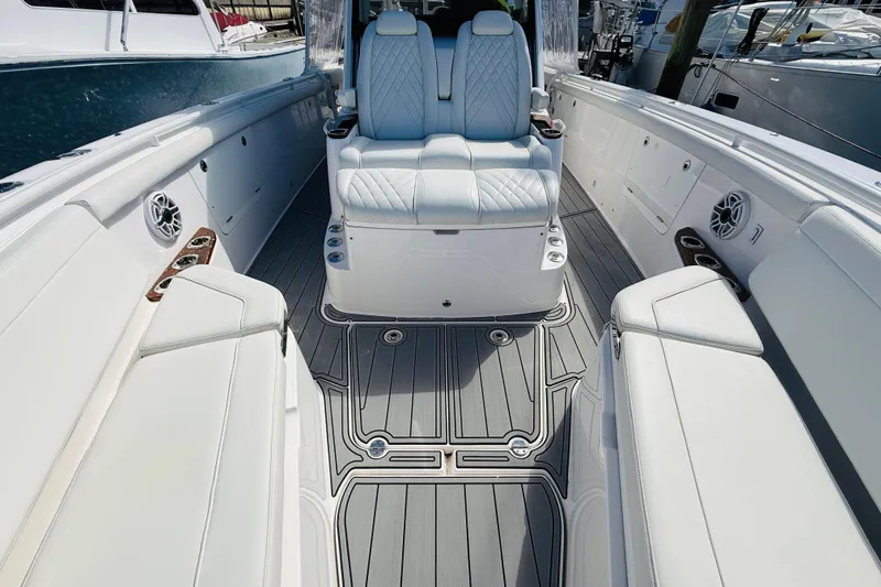 Slide: The Image of Luxurious interior of 2021 Everglades 395 Center Console boat with plush seating. - 9