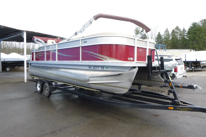 Slide: The Image of 2012 Crest 230SLR Classic pontoon boat on trailer, parked outdoors. - 3