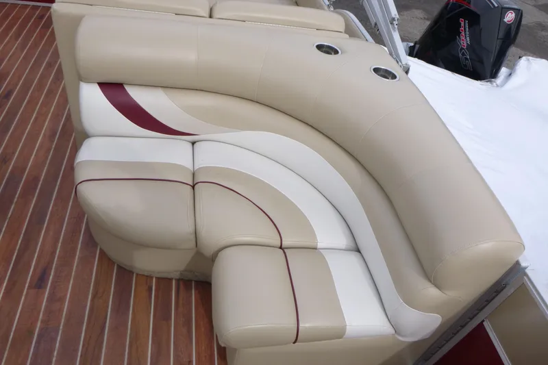 Slide: The Image of Luxurious beige seating on 2012 Crest 230SLR Classic boat with cup holders. - 8