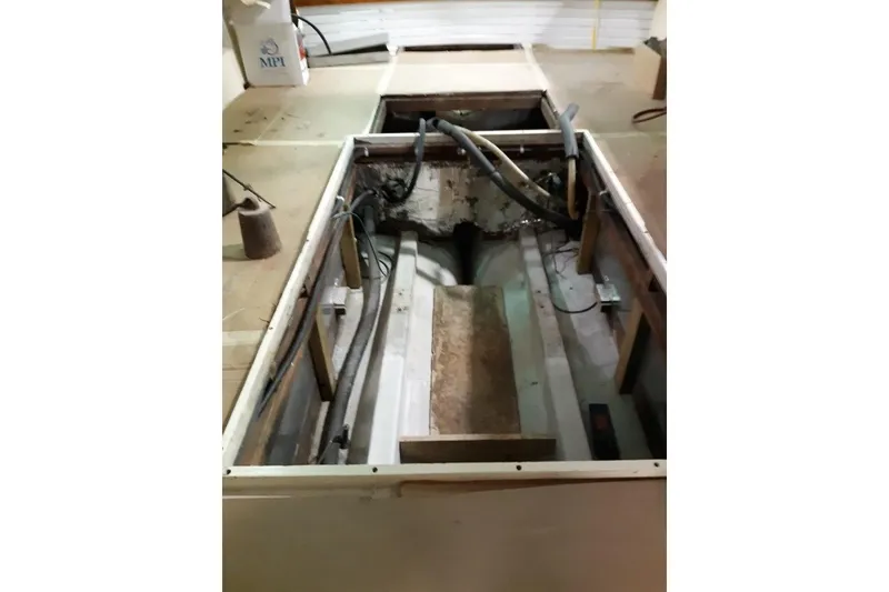 Slide: The Image of 1986 Dyer Hardtop interior showing engine compartment and wiring. - 35