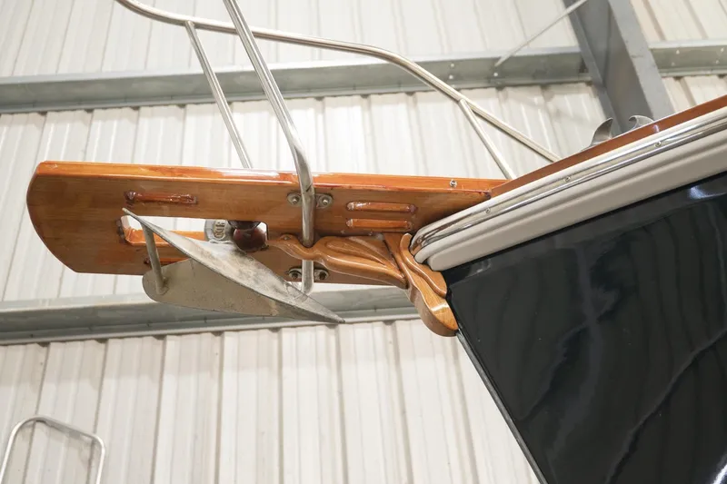 Slide: The Image of 1986 Dyer Hardtop boat anchor and bow detail in a storage facility. - 39