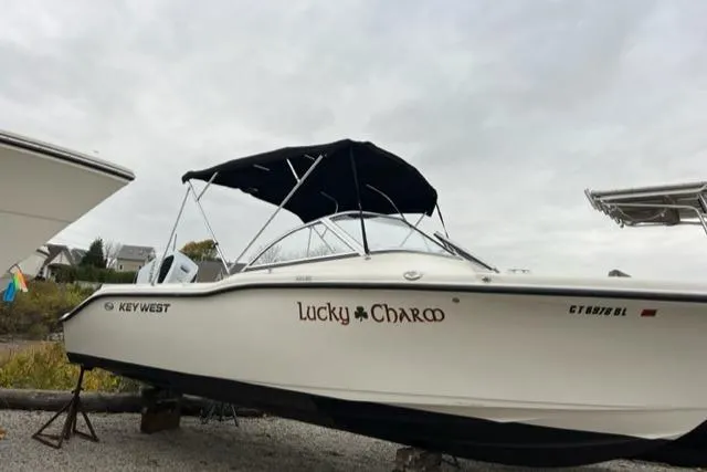 Slide: The Image of 2020 Key West 239 DFS boat named Lucky Charm on a trailer. - 2