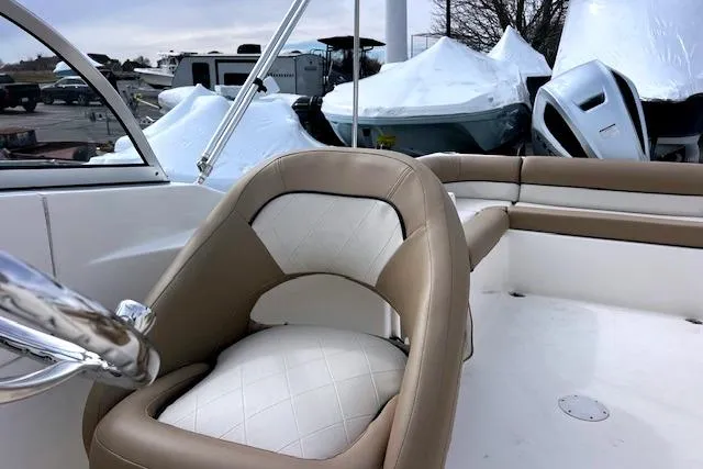 Slide: The Image of 2020 Key West 239 DFS boat interior with tan and white seating. - 9