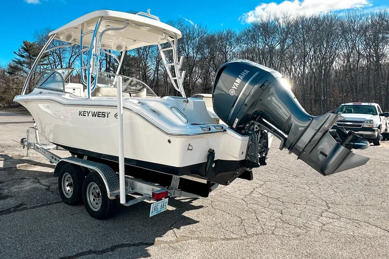Slide: The Image of 2023 Key West 239 DFS boat on trailer with Yamaha outboard motor. - 3