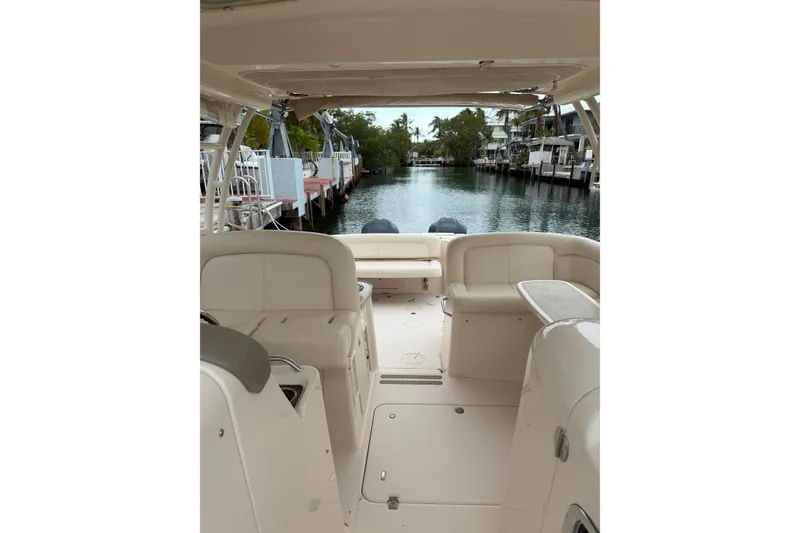 Slide: The Image of 2015 Grady-White Freedom 335 boat interior with canal view. - 9