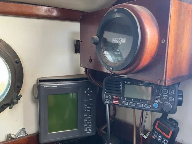 Slide: The Image of 1979 Bristol Channel Cutter navigation equipment with log meter, radio, and GPS display. - 19