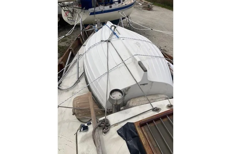 Slide: The Image of 1979 Bristol Channel Cutter sailboat deck with rigging and equipment. - 23