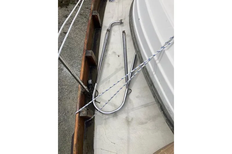 Slide: The Image of 1979 Bristol Channel Cutter deck with metal fittings and ropes. - 24