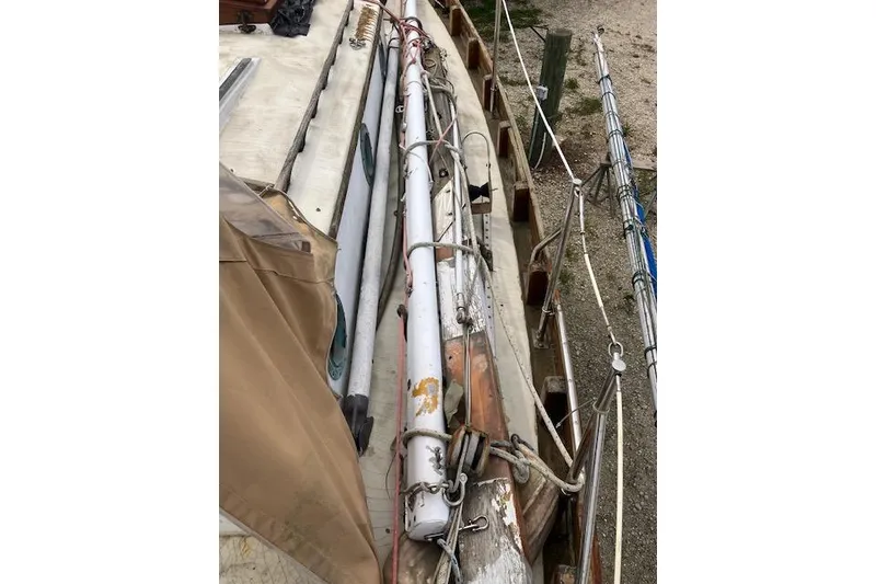 Slide: The Image of 1979 Bristol Channel Cutter sailboat deck with mast and rigging details. - 26
