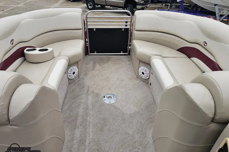 Slide: The Image of Luxurious 2012 Tahoe Pontoon Vision 25' interior with plush seating and cup holders. - 45