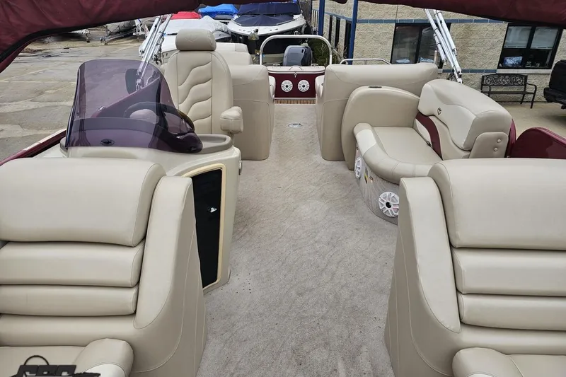 Slide: The Image of Luxurious 2012 Tahoe Pontoon Vision 25' with plush seating and modern design. - 56