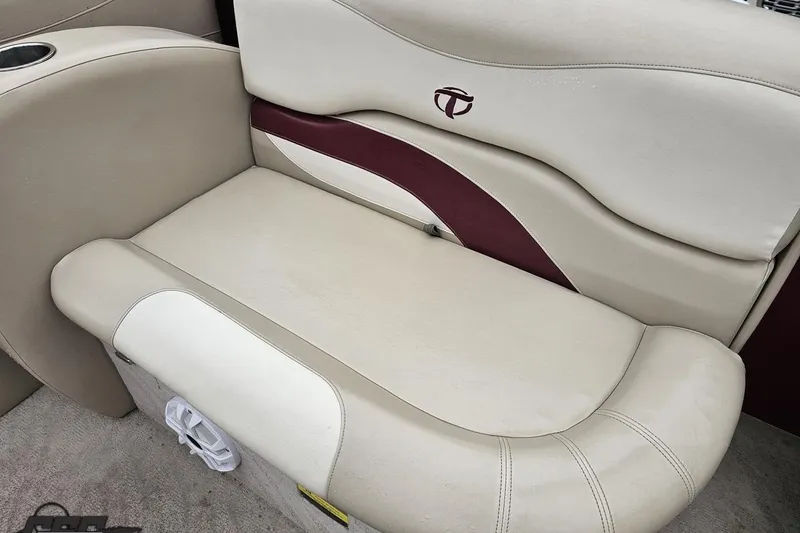 Slide: The Image of 2012 Tahoe Pontoon Vision 25' boat seat with beige and maroon upholstery. - 58