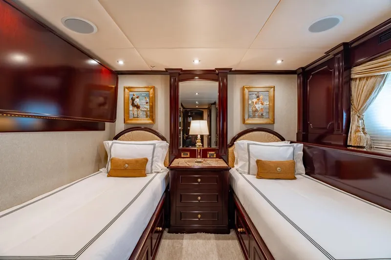 Slide: The Image of Luxurious twin cabin on 2006 Trinity Tri-Deck Motor Yacht with elegant decor and artwork. - 20