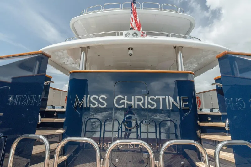 Slide: The Image of Luxury 2006 Trinity Tri-Deck Motor Yacht "Miss Christine" docked, showcasing elegant design. - 35