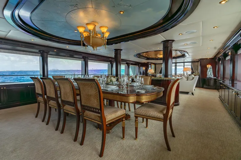 Slide: The Image of Luxurious dining area on 2006 Trinity Tri-Deck Motor Yacht with ocean views. - 4