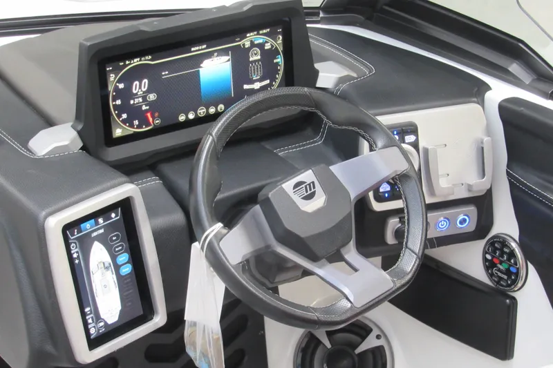 Slide: The Image of Dashboard of 2021 Malibu Wakesetter 21 VLX boat with modern controls and displays. - 6