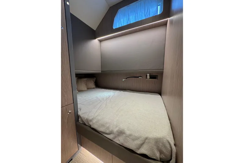 Slide: The Image of Luxurious cabin interior of 2023 Canados 43 yacht with cozy bed and modern design. - 10