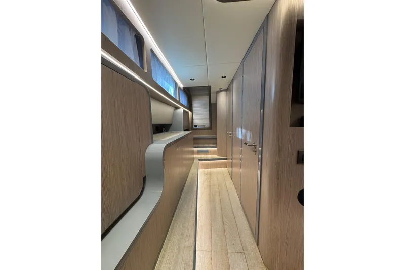 Slide: The Image of Luxurious interior of 2023 Canados 43 yacht, featuring sleek wood finishes and modern design. - 13