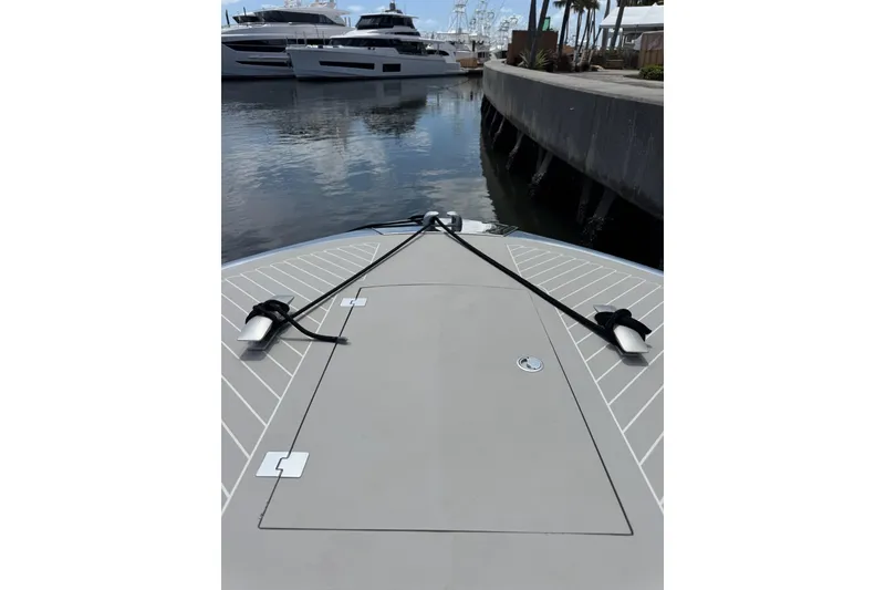 Slide: The Image of Bow view of 2023 Canados 431 yacht docked at marina. - 16