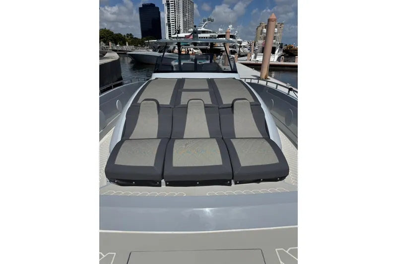 Slide: The Image of Luxury Canados 431 yacht deck with sun loungers, 2023 model, docked in marina. - 17