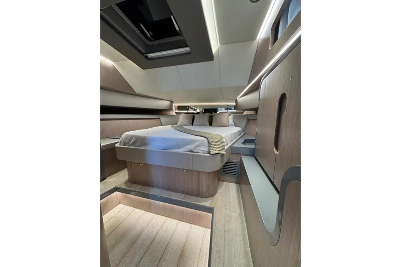 Slide: The Image of Luxurious interior cabin of 2023 Canados 43 yacht with modern design and cozy bedding. - 2