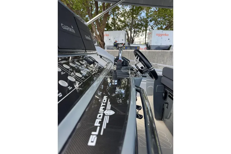 Slide: The Image of Helm of 2023 Canados 431 yacht featuring advanced Garmin navigation system. - 21