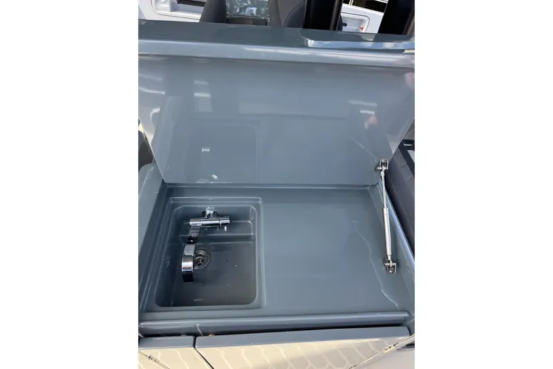 Slide: The Image of Open sink compartment on 2023 Canados 431 yacht, featuring a modern faucet design. - 27