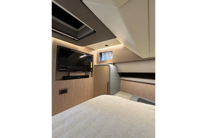 Slide: The Image of Luxurious interior of 2023 Canados 43 yacht with modern TV and sleek design. - 4