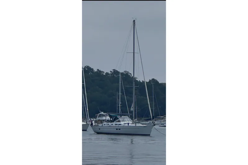 The Image of Sailboat anchored in calm waters, Beneteau Oceanis 42CC, 2005 model. - 0