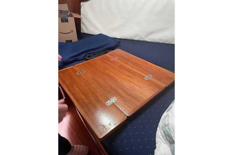 Slide: The Image of Wooden table on Beneteau Oceanis 42CC sailboat, year 2005. - 26