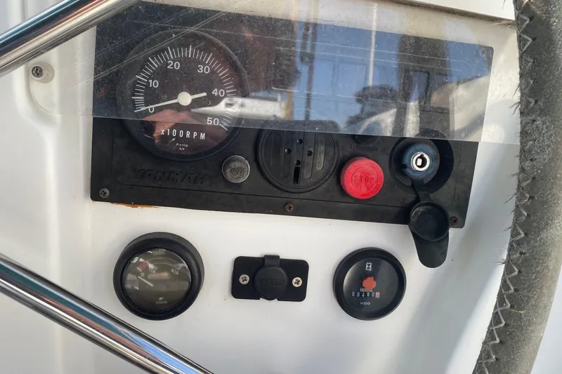 Slide: The Image of Control panel of a 2005 Beneteau Oceanis 42CC sailboat with gauges and switches. - 30