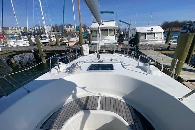 Slide: The Image of 2005 Beneteau Oceanis 42CC sailboat docked at marina, sunny day. - 31