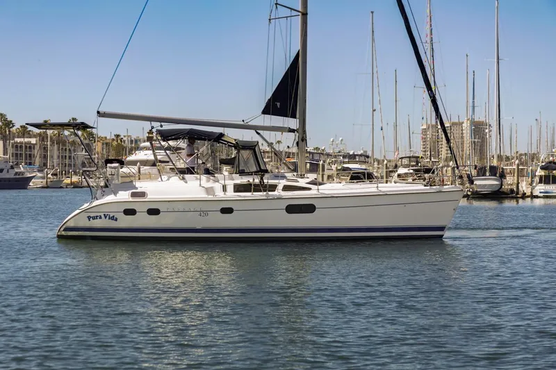 The Image of Sailboat "Pura Vida," Hunter Passage 420, 2000 model, docked in a marina. - 0