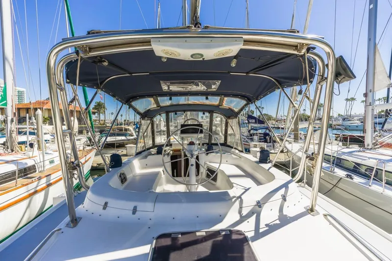 Slide: The Image of Cockpit view of 2000 Hunter Passage 420 sailboat docked in marina. - 10