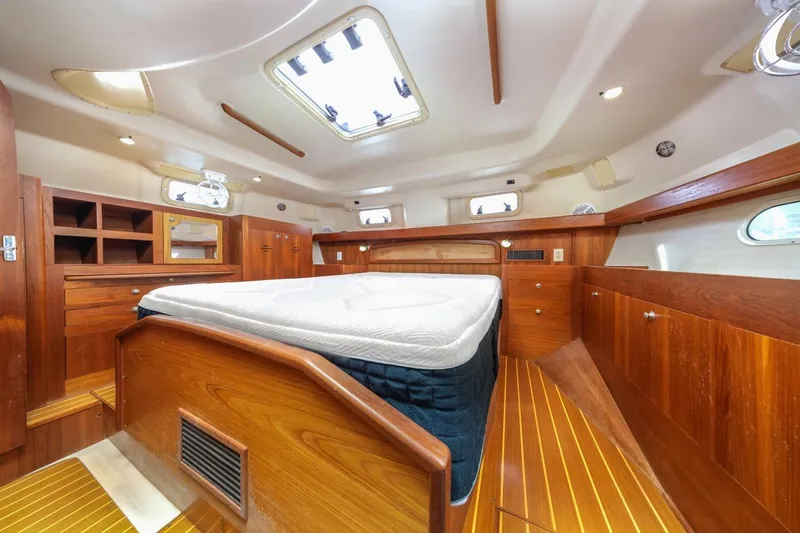 Slide: The Image of Luxurious cabin interior of 2000 Hunter Passage 420 yacht with wooden furnishings. - 31