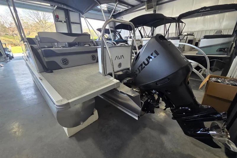 Slide: The Image of 2026 Avalon LSZ 2185 Cruise Rear Bench with Suzuki outboard motor in showroom. - 10