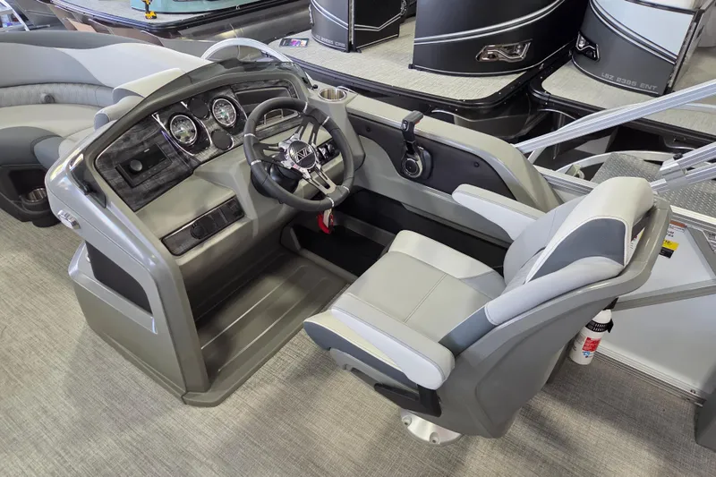 Slide: The Image of 2026 Avalon LSZ 2185 Cruise Rear Bench boat interior with modern helm and seating. - 5