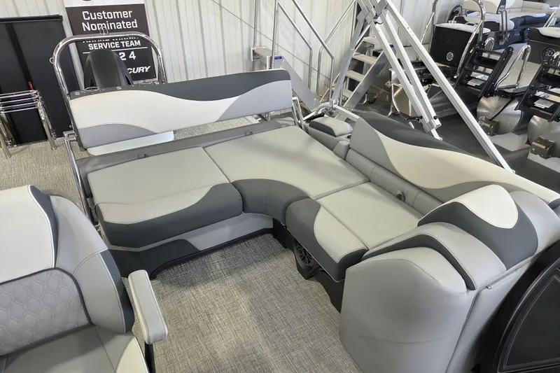 Slide: The Image of 2026 Avalon LSZ 2185 Cruise Rear Bench with modern gray seating in showroom. - 6