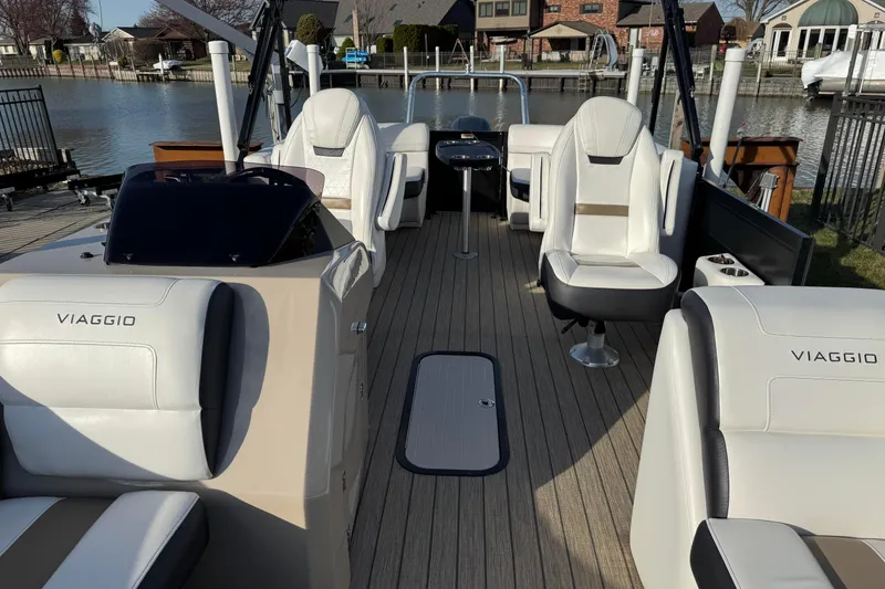 Slide: The Image of 2022 Viaggio Diamante 23 U boat interior with white seating and sleek design. - 13