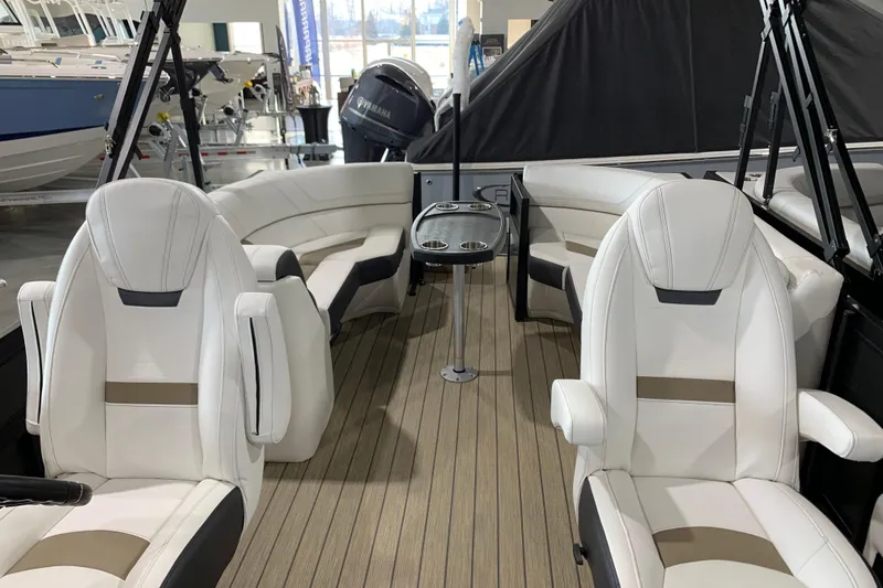 Slide: The Image of Luxurious interior of 2023 Viaggio Diamante 23 U boat with white seating and wood flooring. - 4