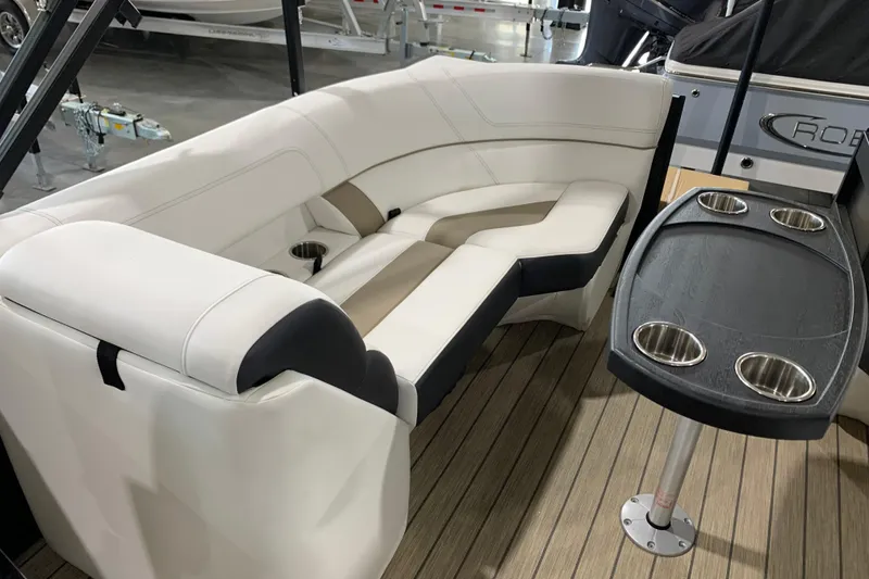 Slide: The Image of Luxurious seating area on 2023 Viaggio Diamante 23 U boat with cup holders and wood flooring. - 6