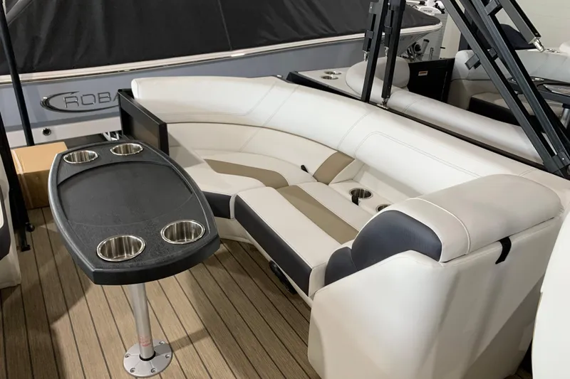 Slide: The Image of Luxurious seating area on 2023 Viaggio Diamante 23 U boat with cup holders and table. - 7