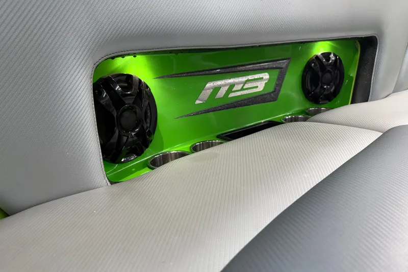 Slide: The Image of Interior of 2015 MB B-52 23 Widebody with green panel and speakers. - 13