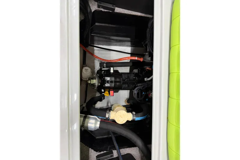 Slide: The Image of Engine compartment of 2015 MB B-52 23 Widebody boat, showing mechanical components and wiring. - 16