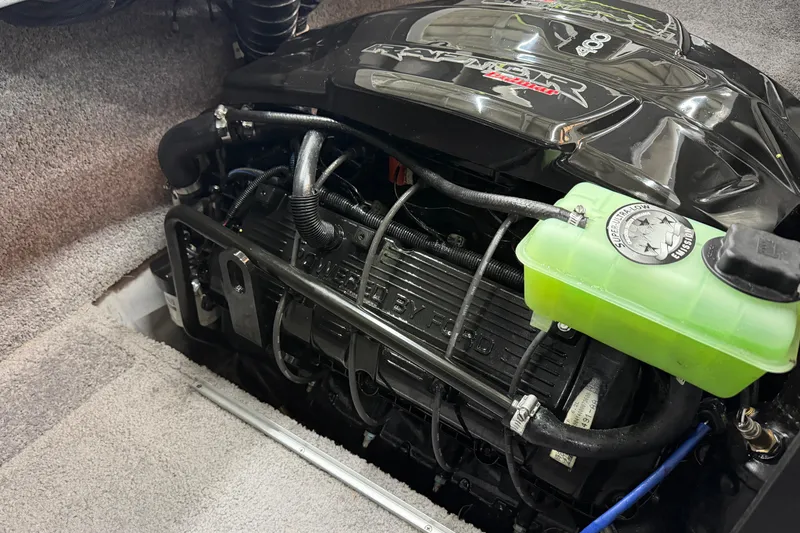 Slide: The Image of Engine compartment of 2015 MB B-52 23 Widebody boat with green coolant reservoir. - 18