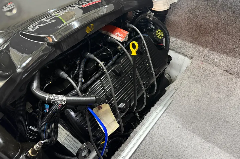 Slide: The Image of Engine compartment of a 2015 MB B-52 23 Widebody boat, showcasing detailed components. - 19